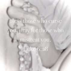 a woman laying down with her hands folded over her chest and the words, blessing those who curse you, pray for those who