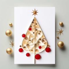 a christmas tree made out of buttons on top of a white card with gold ornaments around it