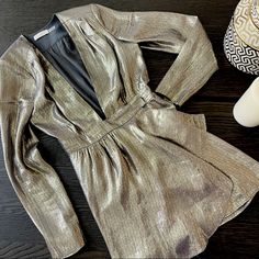 Gorgeous Metallic Dress Size Small Worn Once For New Year’s Eve 2020 Luxury / Eye Catching Luxury V-neck Dresses For Fall, Chic Metallic V-neck Dress, Luxury Metallic Dress For Night Out, Luxury V-neck Mini Dress For Party, Metallic Long Sleeve Mini Dress For Cocktail, Chic Metallic Dresses For Formal Occasions, Luxury V-neck Mini Dress For Cocktail, Chic Gold Mini Dress For Dinner, Chic Formal Metallic Dresses