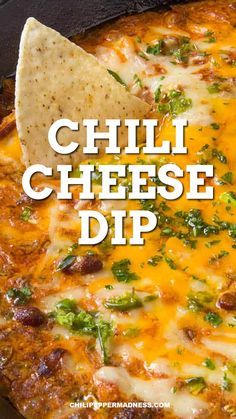 a cheesy dip with tortilla chips on top and the words chilli cheese dip above it