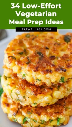 two crab cakes stacked on top of each other with cheese and green onions in the middle