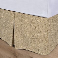 the bed skirt is made from natural materials