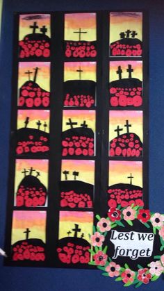 this is an image of a wall hanging with crosses and flowers in the background that says, best we forget