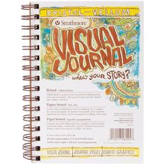 a spiral notebook with the words visual journal written on it