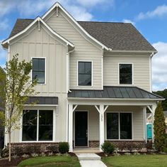 a large white house with two story windows