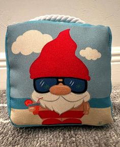 a pillow with an image of santa clause on it