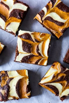 brownies with white and orange swirled toppings