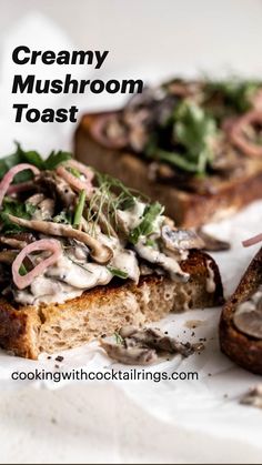 two pieces of bread with mushrooms and greens on them