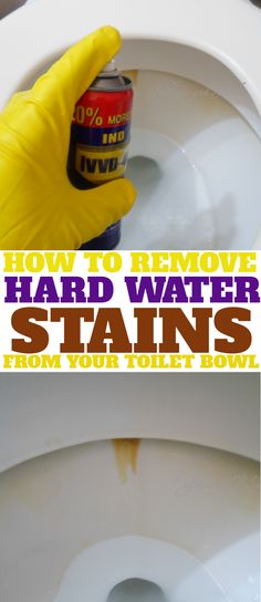 a person in yellow rubber gloves cleaning a white toilet with a can of water on it