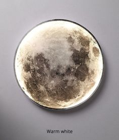 an image of a full moon in the sky on a white background with words written below it