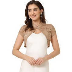 An elegant stand collar and short sleeves make this beautiful lace cardigan a great outfit for any occasion. This lace bolero is perfect for a wedding dress. Team it with a sleeveless dress and a mini bag to complete the elegant look. Lend an understated detail to your formal ensemble with this cropped bolero. This shrug can be paired with many suspender dresses to perfect your outfit. Short Sleeve Bolero, Lace Shrug, Cropped Shrug, Lace Bolero, Bolero Cardigan, Lace Cuffs, Lace Cardigan, A Wedding Dress, Lace Neckline