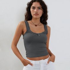 Experience the ultimate in sexy style with this slim-fit tank top made from comfortable jersey fabric. Featuring a solid pattern with lace, tulle, and fishnet elements, this crop top is versatile enough to pair with any bottom. The crew neckline adds a touch of sophistication, making it the perfect addition to your summer wardrobe. Made from high-quality polyester, it's the ultimate must-have for the season. Lace Camisole Top, 90s Hip Hop Fashion, Trendy Summer Outfits, Lace Camisole, Swimwear Dress, Cute Crop Tops, Ribbon Design, Hipster Fashion, Knitted Tank Top