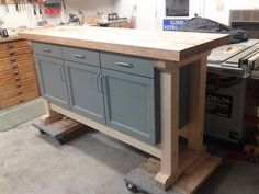 a workbench in a garage with tools on it