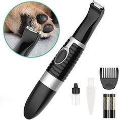 a dog's paw is shown next to an electric clipper