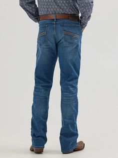 A MODERN TAKE ON A CLASSIC FIT Wrangler® 20X® vintage bootcut jeans combine the comfort you want with the durability you need to take on each day with confidence. No. 42 jeans from the Wrangler® 20X® collection are finished with distressed detailing for an instant broken-in appeal. They sit just below the waist for a casual look you can wear on any occasion. They also feature a slim seat and thigh as well as a full opening from the knee down to leave room for your boots. The Wrangler® 20X® vinta Vintage Bootcut Jeans, Bootcut Jean, Wrangler Jeans, Men's Apparel, Each Day, Bootcut Jeans, Men's Jeans, The Knee, Casual Looks