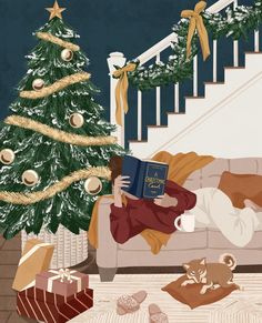 a person laying on a couch reading a book in front of a christmas tree and stairs