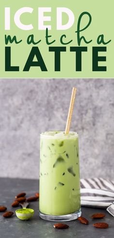 an iced matcha latte in a glass with a straw