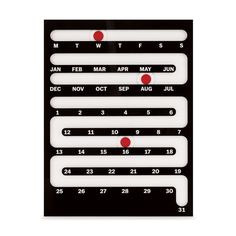 a black and white calendar with red dots on it's side, showing the date for