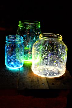 three jars with glowing lights on them and the words holiday joy is happening on ebay