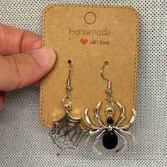 These Are Handmade By Me Spider And Spider Web Earrings. The Spider Web Is About Inch High And About An Inch Wide. The Spider Is Little Over An Inch High And A Little Over An Inch Wide. Please Refer To Photos For More Accurate Measurements And Sizing. The Earrings Are Made Out Of Hypoallergenic Iron And Zinc Alloy. They Feature A Rubber Stopper On The Back. Please Refer To The Video To See All Of The Beautiful Details Of These Earrings. These Earrings Are Perfect For Halloween! Earrings Contain Small Parts May Be A Choking Hazard. Spider Web Earrings, The Spider, Halloween Earrings, Hand Crafted Jewelry, Crafted Jewelry, Spider Web, Handcrafted Jewelry, Jewelry Crafts, Zinc Alloy