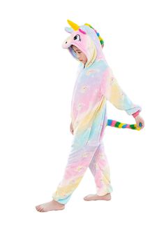 a child in a unicorn costume is walking