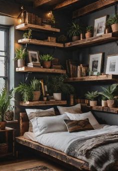 a bed with lots of potted plants on top of it in front of a window