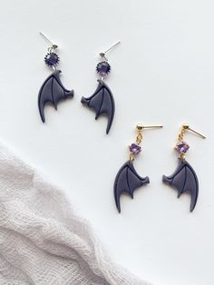 The Bat Boys! Earrings inspired by Rhysand from A Court of Thorns and Roses series by Sarah J Maas Acotar Earrings, Boys Earrings, The Bat Boys, Dragon Stuff, Bat Boys, Court Of Thorns And Roses, Earrings Clay, School Collection, Sarah J Maas