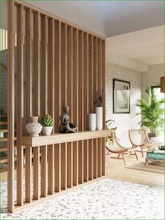 a living room with wooden slats and plants on the shelves in front of it