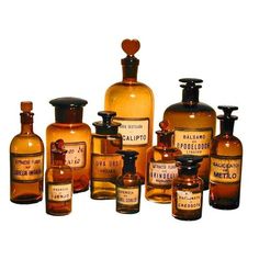 an assortment of old fashioned medicine bottles