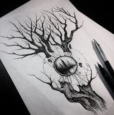 a pencil drawing of a tree with planets in it