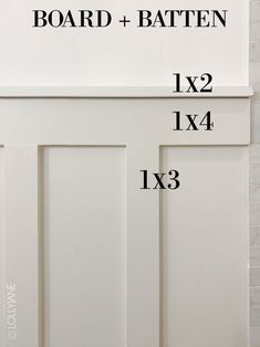 measurements for the door and bottom panel on a white kitchen cabinet with brick wall behind it