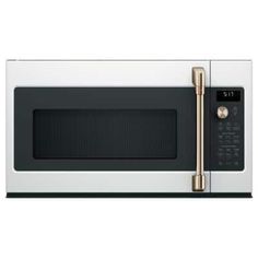 a microwave oven with the door open and a handle on it's left side