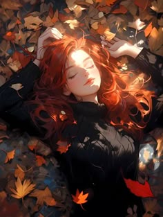 a woman laying on top of leaves with her head resting on her hands and eyes closed