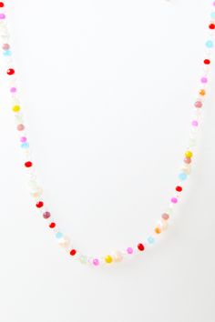 This Tessa Bead And Pearl Necklace is the perfect accessor-eye for your summer wardrobe! Colorful beaded strands are interspersed with lustrous pearls, creating a magnificent mashup that brightens any outfit! So flaunt your style on a sunny day and let your personality shine! Summer Party Beaded Necklaces With Round Beads, Multicolor Pearl Beaded Necklaces For Parties, Summer Party Beaded Necklace With Beaded Chain, Summer Party Beaded Necklaces, Summer Party Beaded Necklace, Multicolor Pearl Necklace With Colorful Beads For Party, Festival Pearl Beaded Necklaces, Summer Festival Beaded Necklace With Faceted Beads, Pink Pearl Necklace With Tiny Beads