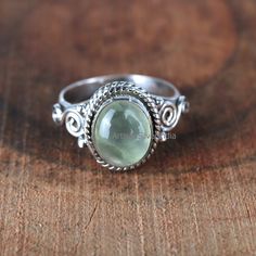 Prehnite Gemstone Ring, 925 Silver Ring, Vintage Ring, Dainty Ring, Prehnite Jewelry, Gift For Her, Women Ring, Wedding Ring, Gift For Mom. Material: 925 Solid Sterling Silver Gemstone: Natural Prehnite Stone Shape: Oval Stone Size: 7x9 mm Weight: 3.00 GM Genuine 925 Solid Silver Handmade Ring Lowest Price Guaranteed ''Spring Trends'' THIS ALL DESIGN IS CRATED BY ARTISANSILVERINDIA ITS ORIGINAL DESIGN NO OTHER SITE IS SELLING THIS !! One-Of-Kind Item !! !! Artisan jewelry !! !! Halloween !! !! Christmas Day !! !! Christmas Offer !! !! Etsy Cyber 2020 !! Jaipur Silver 925 !! Best Seller bridesmaid Gift !! !! personalized jewelry  !! Birth Stone Earring !! Boho Magic Silver Boho Magic Silver Jewellery personalized gift best_friend_gifts A one-of-a-kind community Peace of mindetsy-gift-guides Crystal Silver Rings, Green Amethyst Sterling Silver Ring Gift, Green Amethyst Ring In Sterling Silver, Handmade Green Sterling Silver Birthstone Ring, Prehnite Ring Jewelry Gift, Green Sterling Silver Moonstone Ring Gift, Prehnite Ring Jewelry For Gifts, Prehnite Ring Suitable For Gift, Green Oval Prehnite Rings