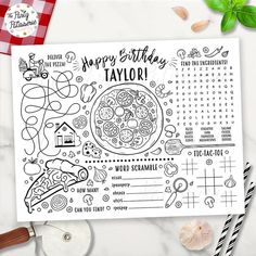 a happy birthday card with pizza and other things to eat on it, next to some candy