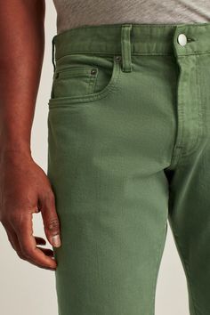 Extra Stretch Travel Jeans | Bonobos Green Relaxed Fit Jeans With Hip Pockets, Green Relaxed Fit Jeans, Solid Cotton Bottoms With Five Pockets, Solid Cotton Tapered Leg Jeans, Solid Color Cotton Tapered Leg Jeans, Solid Color Tapered Leg Cotton Jeans, Fitted Green Bottoms For Everyday, Washed Cotton Bottoms, Mid-rise Green Cotton Jeans