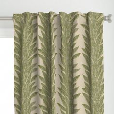 a curtain with green leaves on it