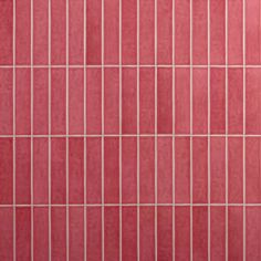 a red tiled wall with white lines on it