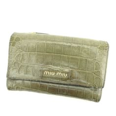 miu miu Cute Wallets, Miu Miu Wallet, Pretty Bags, Trifold Wallet, Tri Fold, Card Holder Wallet, Cute Bags, Grey And Gold, Embossed Leather