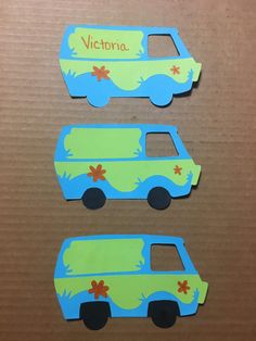 two pieces of paper cut out of the shape of a van with words victoria on it