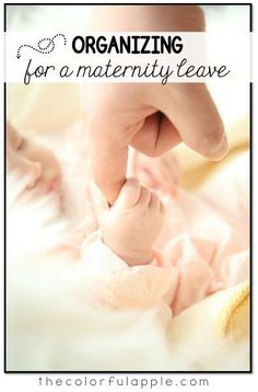 a baby's foot is being held up by its mother