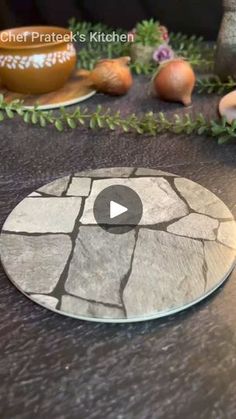 a stone cutting board sitting on top of a table