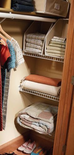 a closet filled with lots of clothes next to a wooden cabinet full of folded shirts