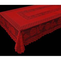 a red tablecloth on a black background