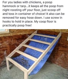 a wooden bed frame sitting in the corner of a room next to a brick wall