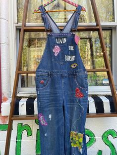 Hand stitched, hand patched overalls; Mae Lettuce; have a little stretch; adjustable 36x28 Measurements: 36 inch Waist , 40 inch hips, 28 inch inseam NO RETURNS!  If you have issues with shipping please take up with USPS.  We try to represent our items as they are.  We want you to be thrilled with your purchase from Tripp's Store, an emporium of fun and funky.  Thank you for shopping with us.  We are a community oriented small business in downtown Mt. Carmel Church Road, outside of Chapel Hill, Patchwork Denim Jeans, Jean Overalls, Bib Overalls, Chapel Hill, Denim Patchwork, Bespoke, Hand Stitching, Denim Jeans, Overalls