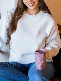 Made with the softest materials, this sweatshirt is designed to keep you warm and comfortable all season long. Whether you are lounging at home or running errands, this sweatshirt will be your go-to choice. Sizing: Small 4-6 Medium 8-10 Large 12-14 XL 14-16 Comfy Relaxed Fit Sweatshirt For Relaxation, Crew Neck Sweatshirt With Ribbed Cuffs For Relaxation, Relaxation Crew Neck Sweatshirt With Ribbed Cuffs, Oversized Crew Neck Sweatshirt For Relaxation, Cozy Heather Grey Sweatshirt For Fall, Cozy Super Soft Everyday Sweatshirt, Cozy Relaxed Fit Soft-washed Sweats, Comfortable Cozy Fit Sweats For Relaxation, Cozy Soft-washed Everyday Sweater