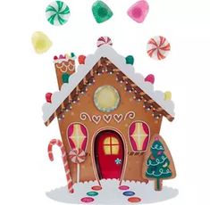 a gingerbread house with candy and lollipops coming out of the door