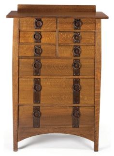 a wooden cabinet with many drawers and knobs